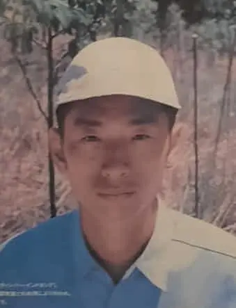 仲摩 栄一郎